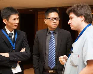 Weinmin Liang, Zhang Xiaoguang y Jordi Armengol.