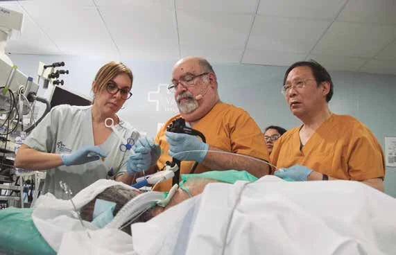 Ana Benages, Roberto Fogel y Fan Zhining durante su intervención.